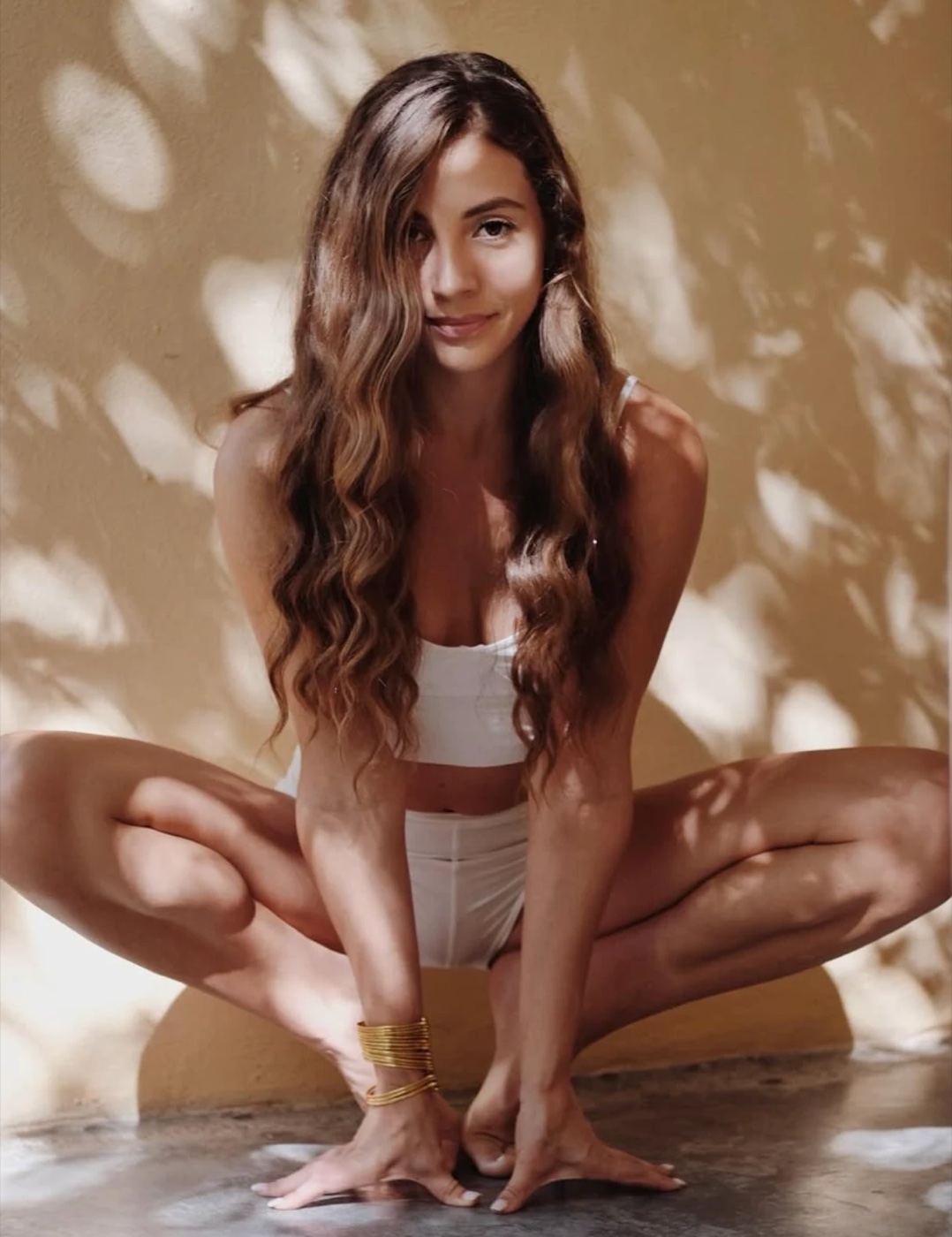 Angela Rose Yogi practicing yoga in warm natural sunlight
